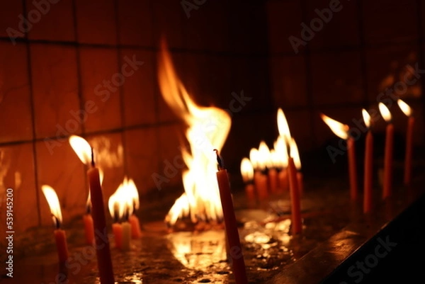 Fototapeta candles in church