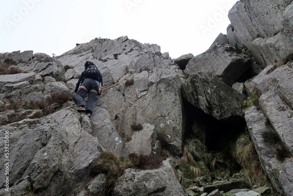 Fototapeta Scotland, Snowdonia. Hiking and climbing ridges through the wilderness during Spring time. Some days are sunny some days are rainy, but all of them are an adventure
