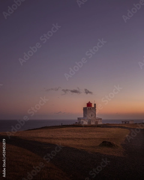 Fototapeta lighthouse at sunset
