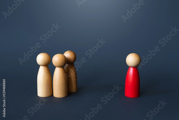 Fototapeta A red man approaches a group of people. Become the leader of the group and win their loyalty. Bullying and threats. Resist the majority. Influence and control. Luring. Seek for support.