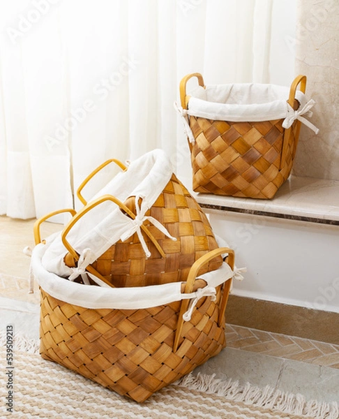 Obraz 3 wicker baskets in a living room setting