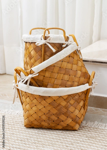 Obraz 3 wicker baskets in a living room setting