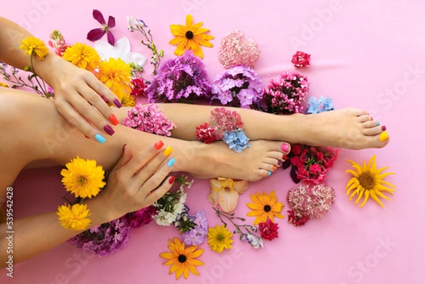 Obraz Multicolored manicure and pedicure on square shaped nails with different flowers.
