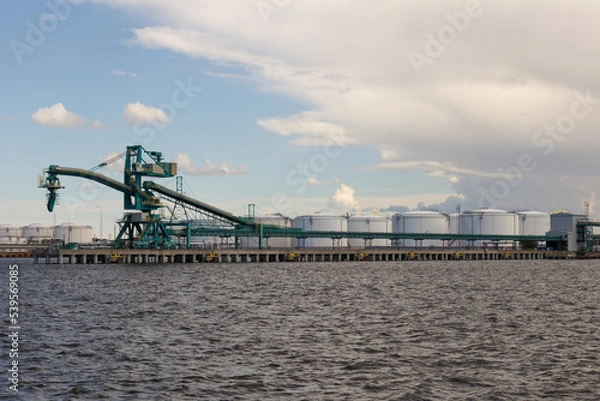 Obraz an empty port chemical cargo terminal on river