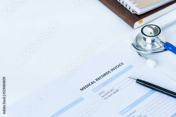 Fototapeta Stethoscope with medical records invoice. on white background.