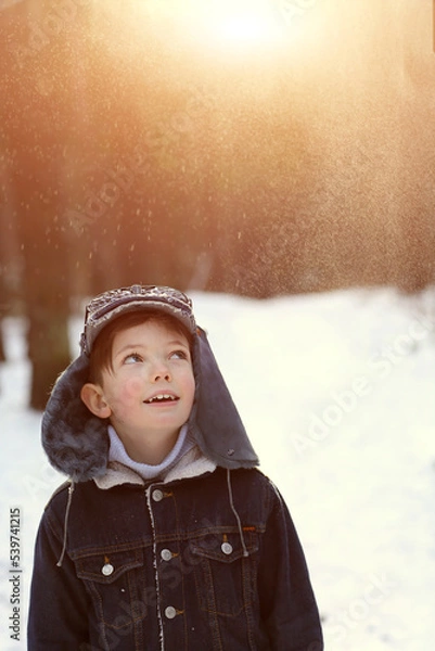 Fototapeta portrait of a child in winter