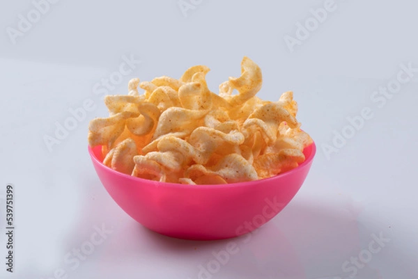 Fototapeta potato chips stack,  Isolated chips for advertising, package or promo ads, delicious food, ripple mealpotato chips stack, pile and heap, with crunchy wavy snack pieces bunches. Isolated chips for