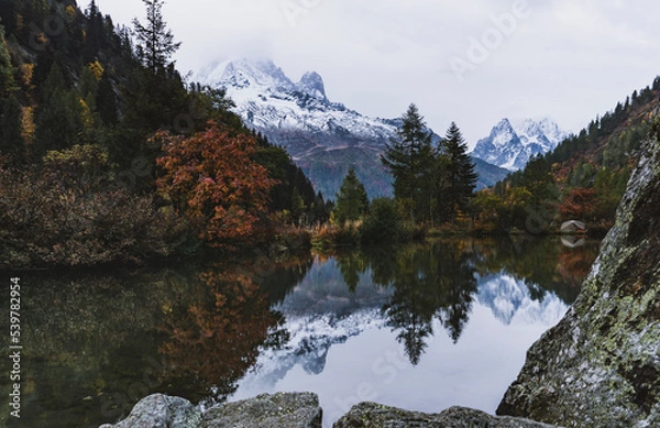 Obraz reflection in mountain lake with tent wildcamping