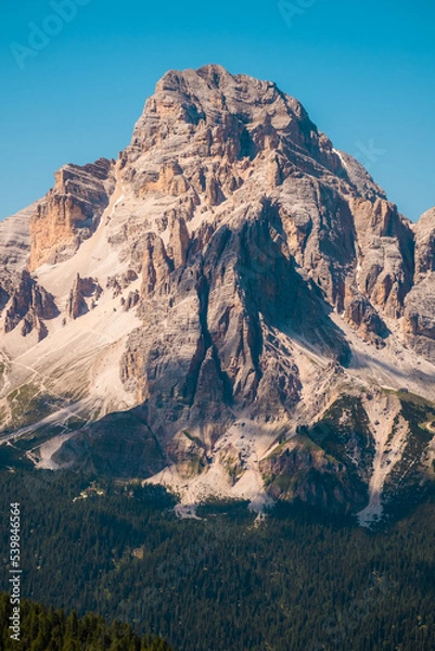 Fototapeta a canyon with a mountain in the background