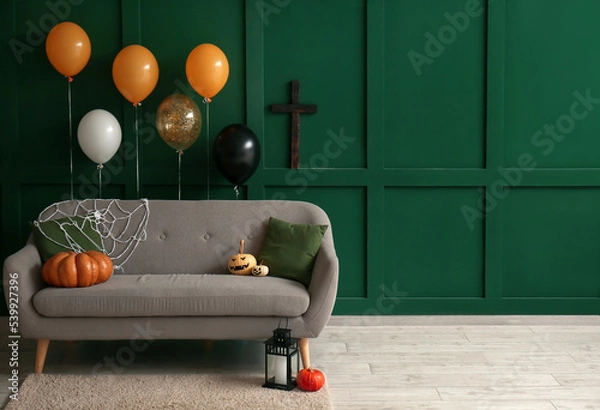 Fototapeta Interior of living room with sofa and Halloween balloons
