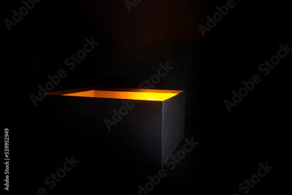Obraz black box with orange light