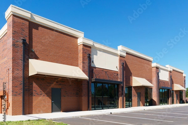 Fototapeta Typical retail small office building front