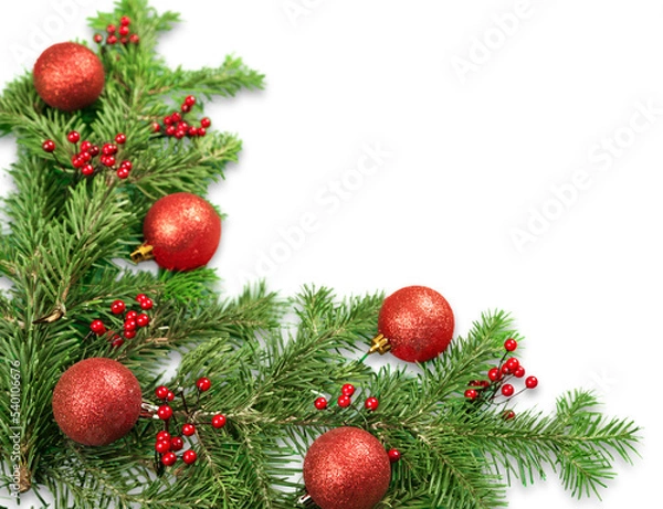 Fototapeta Christmas toys on fir tree branch , isolated on white