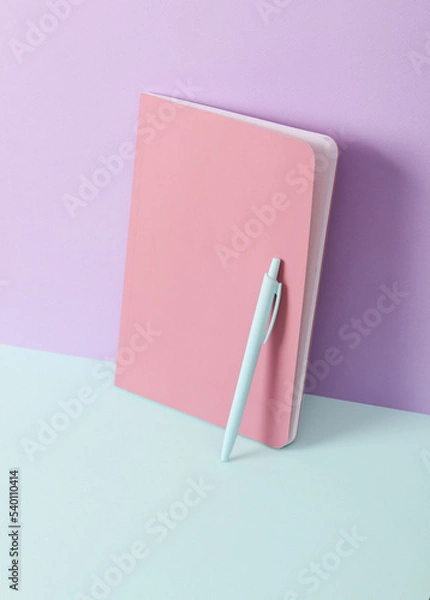 Fototapeta Modern and creative composition with pen on a two tone pastel background. Minimal still life. Fresh idea. Business, education concept