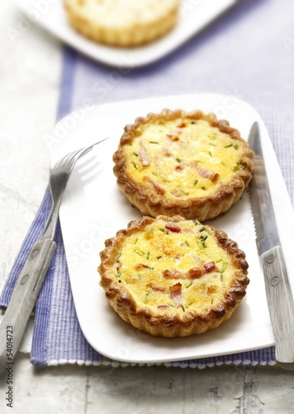 Obraz two quiches with bacon on a plate