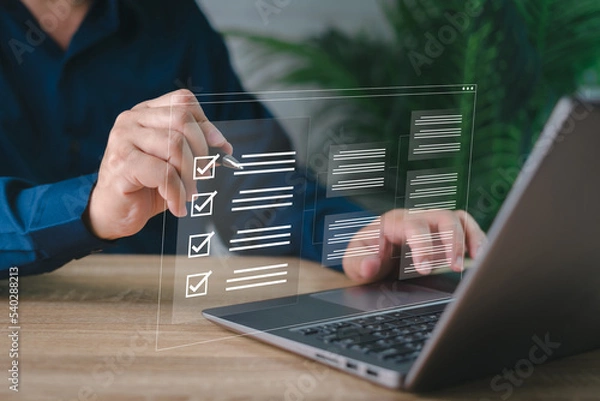Obraz Electronic smart checklist and document on virtual screens concept, business people check electronic documents on digital documents, paperless offices,working on borderless communication technology