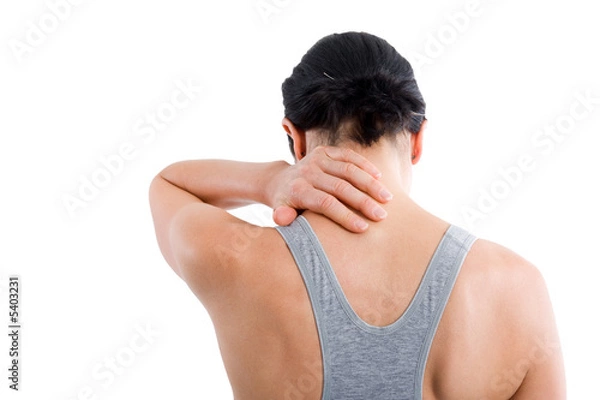 Obraz Sportliche Frau von hinten - hält sich Nacken.