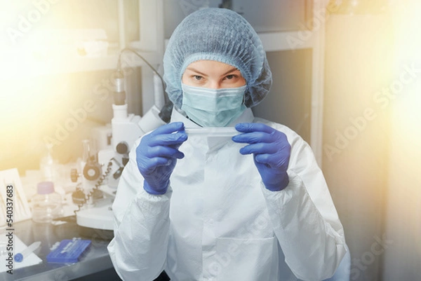 Obraz Scientist or nurse in a Medical Research Laboratory. Test tube