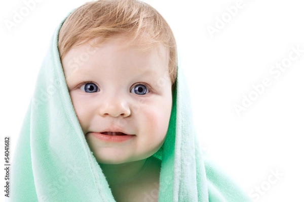 Obraz Boy in a green towel on white