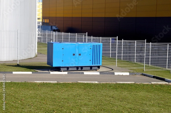 Obraz New blue mobile diesel generator for emergency power supply of the production complex.