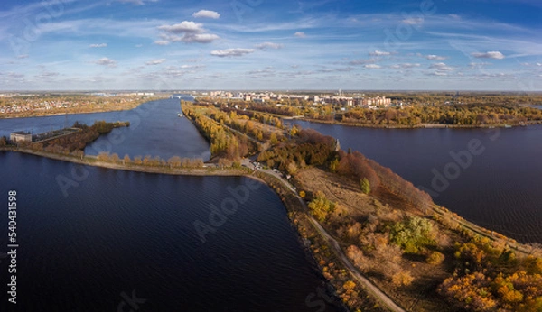 Obraz Panoramic aerial view of city on Volga with dam of water power house in foreground, Dubna, Russia