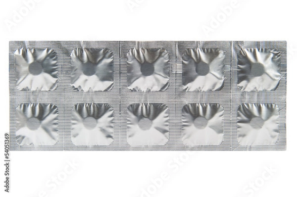 Fototapeta Closed up medicine tablet in aluminum foil strip background