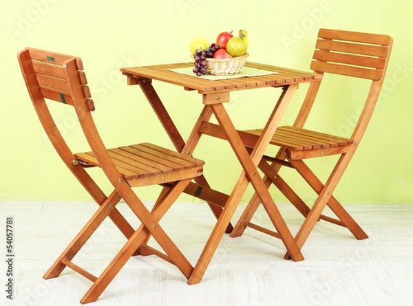 Fototapeta Wooden table with fruit in room