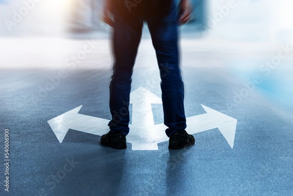 Obraz Man legs standing on three direction arrows