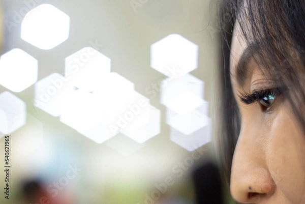 Obraz eyes of woman using smart phone