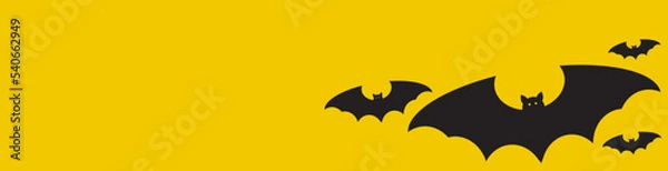 Obraz bat on yellow background.Website spooky,Background or banner Halloween template.