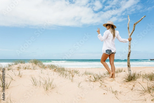 Obraz Woman on pristine seculuded beach Australia good vibes