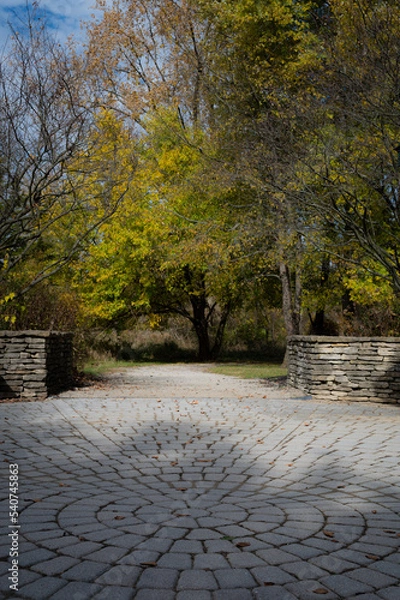 Fototapeta Pathway to a nature park in the fall of the year