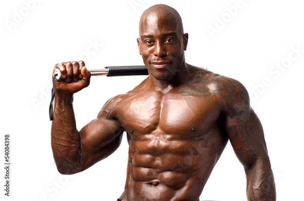 Fototapeta Strong bodybuilder man with perfect abs, shoulders,biceps, chest