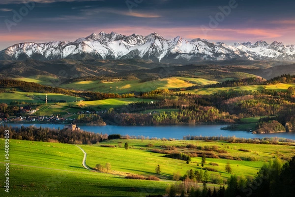 Fototapeta View from the top of Wżdżar - the Pieniny Mountains over the Tatra Mountains, the Czorsztyn Lake and the castle. Spring, Poland.  Widok z góry Wżdżar - pieniny na tatry, jezioro czorsztyńskie i zamek.