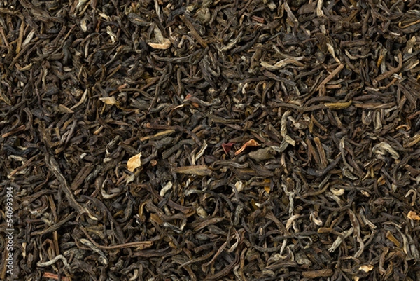 Fototapeta  Dried Chun Hao Jasmin tea leaves, a high quality jasmin tea from the province of Fujian close up as background