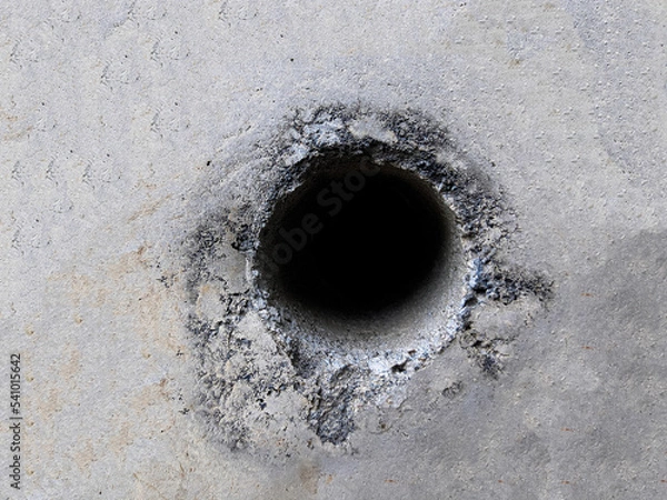 Fototapeta Background texture of cement wall with hole in the middle