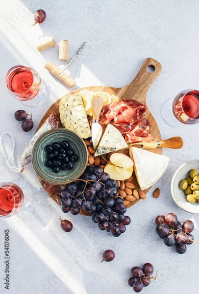 Obraz Wine tasting snack cheese board, top down view