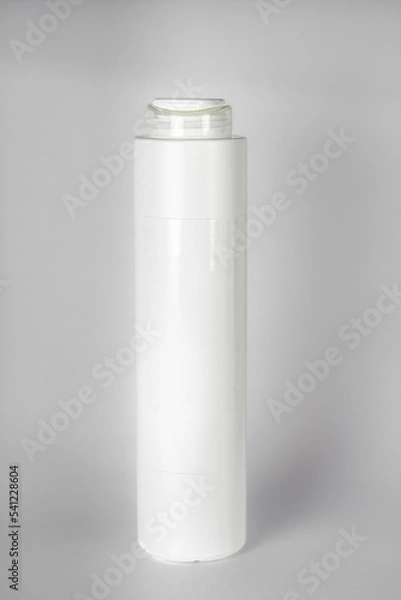 Fototapeta Template for advertising a white shampoo bottle, 3d vector on a gray background. Pot for hygiene, hair and cosmetic products.