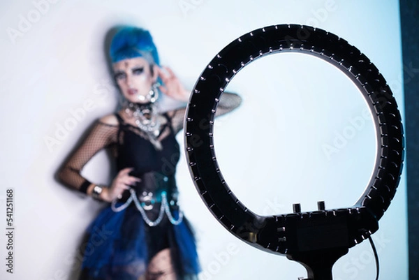 Obraz Blogger girl with blue hair and ring lamp