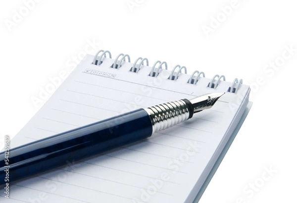 Fototapeta Pen on notebook, isolated on white background.