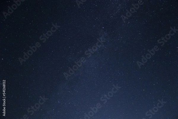 Fototapeta Moonlit sky with stars background