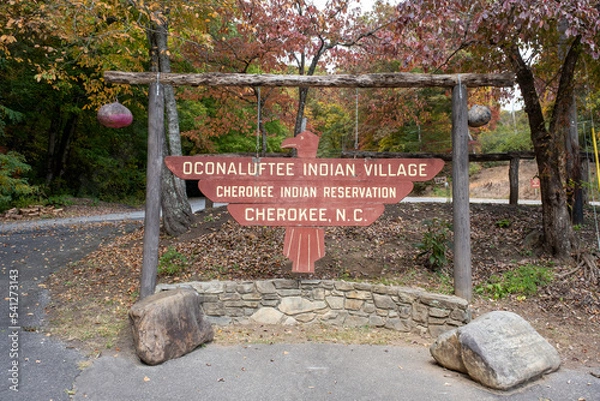 Obraz Cherokee, North Carolina, USA- October 12, 2022: Oconaluftee Indian Village, Cherokee Indian Reservation sign