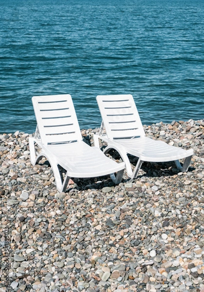 Obraz beach chair on the beach