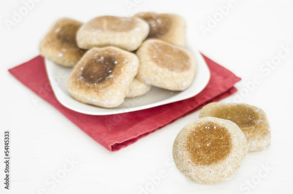 Fototapeta Several breads on white background. Homemade breads