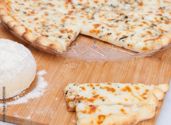 Obraz pizza on a board