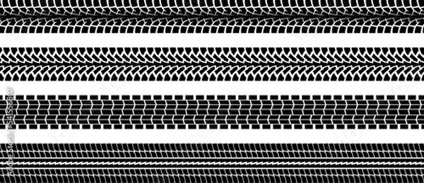 Obraz Tire tread print or car track set isolated on white background. Footprint of bike or vehicle wheels with seamless texture. Top view of rubber protector marks on asphalt. Vector brush.