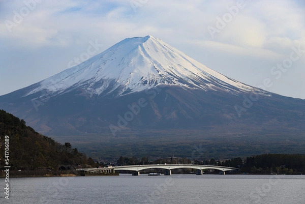 Fototapeta Fuji mountain with snow cover on the top with bridge and Kawaguchi Lake