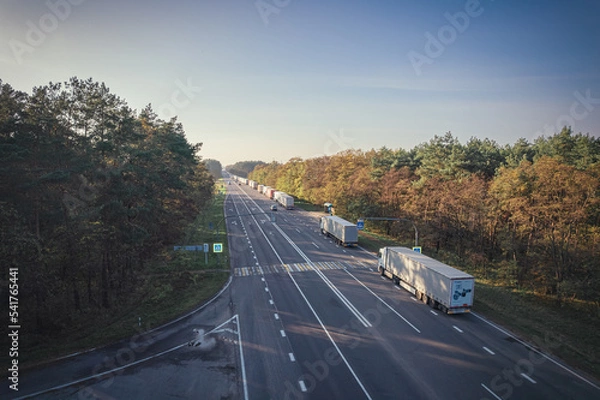Fototapeta A line of trucks on the border of Belarus and Poland