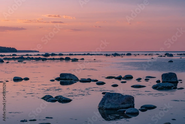 Obraz Beautiful colorful sunset landscape on the rocky shore of a peaceful sea. High quality photo
