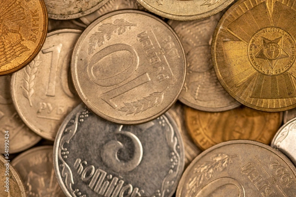 Fototapeta Old coins of the USSR in bulk on a flat surface, background image.
